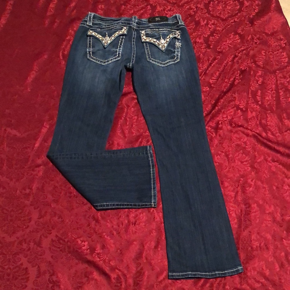 Miss Me Sz 31 dark wash with factory distressing , lots of brown/white bling!!